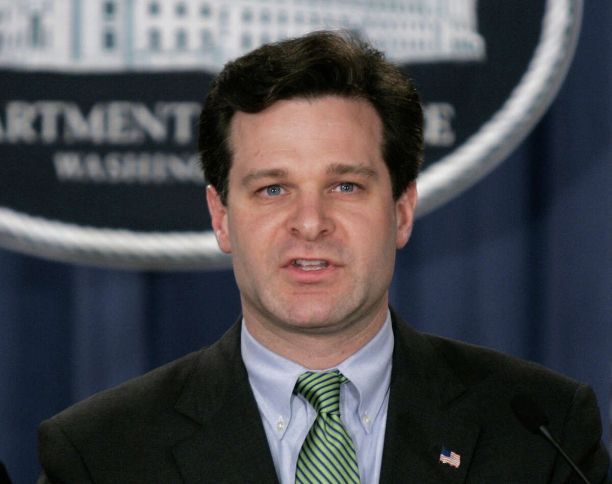 In this Jan. 12, 2005 file photo, Assistant Attorney General, Christopher Wray speaks at a press conference at the Justice Dept. in Washington. President Donald Trump has picked a longtime lawyer and former Justice Department official to be the next FBI director. Trump said on Twitter Wednesday that he will be nominating Christopher Wray, calling him Â?“a man of impeccable credentials.Â?” (AP Photo/Lawrence Jackson)