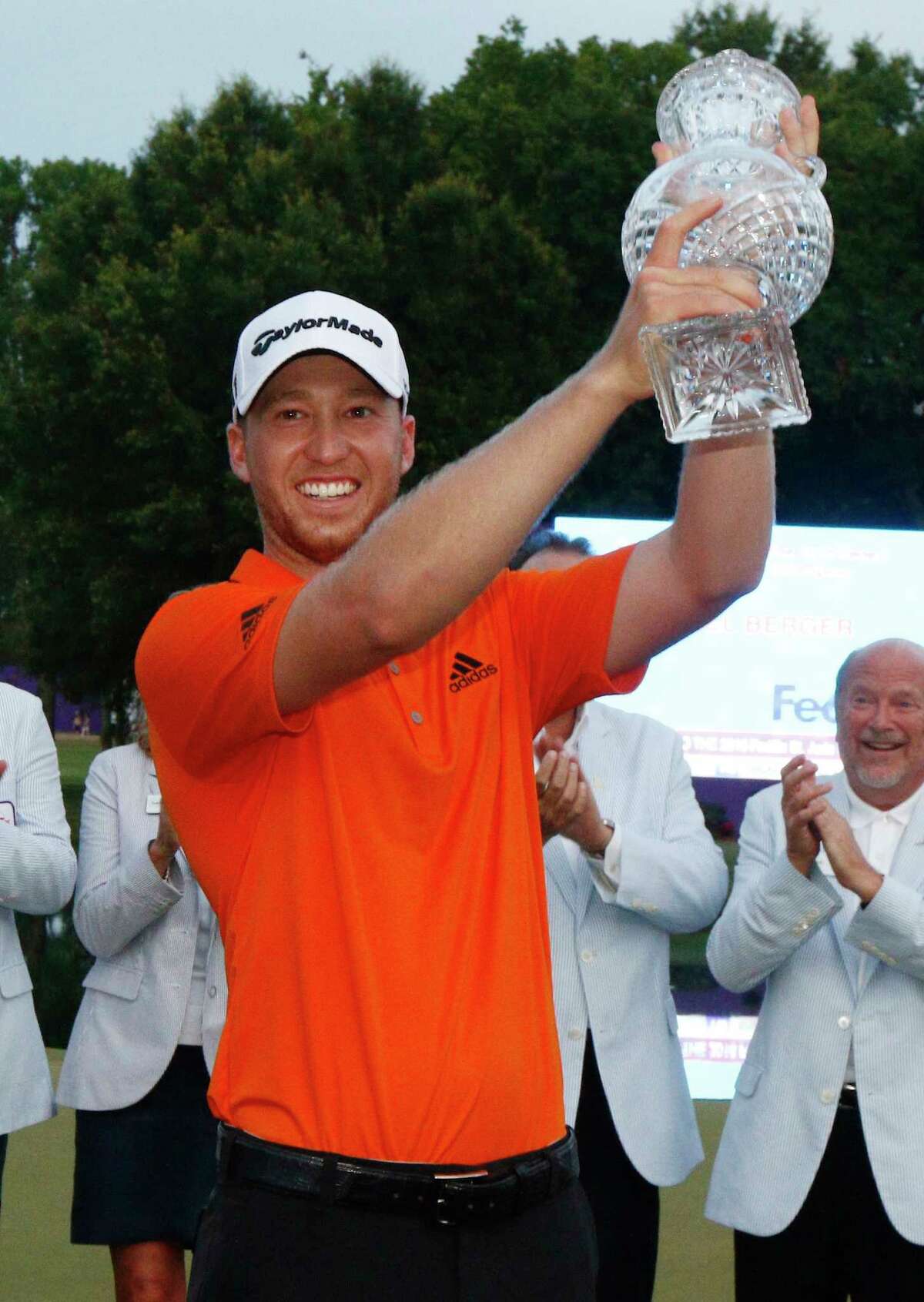 FILE - In this June 12, 2016, file photo, Daniel Berger celebrates winning the FedEx St. Jude Classic golf tournament, in Memphis, Tenn. Berger is back looking to defend his first and only PGA Tour title at the St. Jude Classic. (AP Photo/Rogelio V. Solis, FIle)