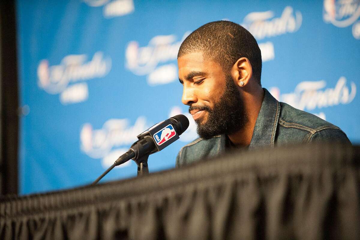 Kyrie Irving of the Cleveland Cavaliers answers questions following their loss to the Golden State Warriors in Game 3 of the 2017 NBA Finals at Quicken Loans Arena on Monday, June 7, 2017 in Cleveland, Ohio.