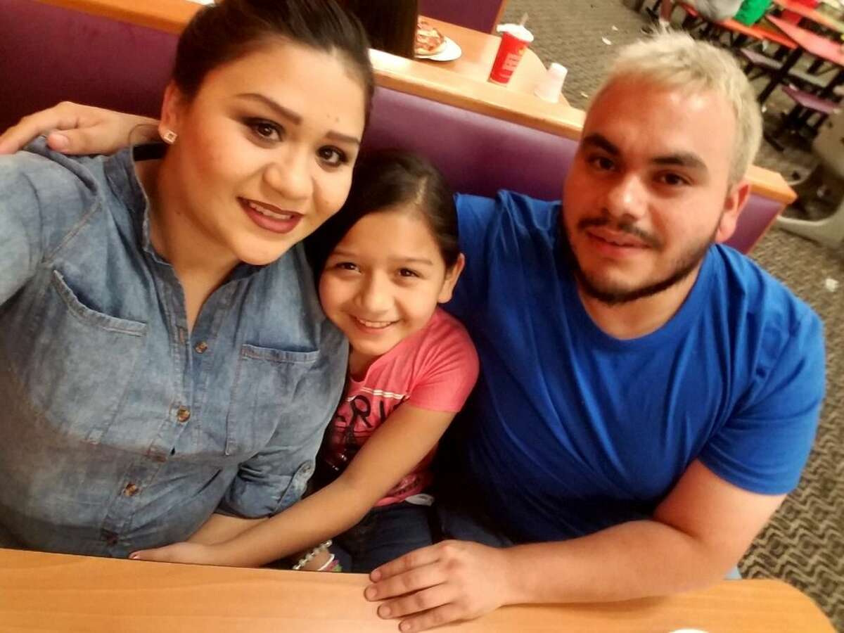 Belinda Muñiz, center, died Tuesday evening in a head-on collision on an overpass at Interstate 35 and Loop 20.