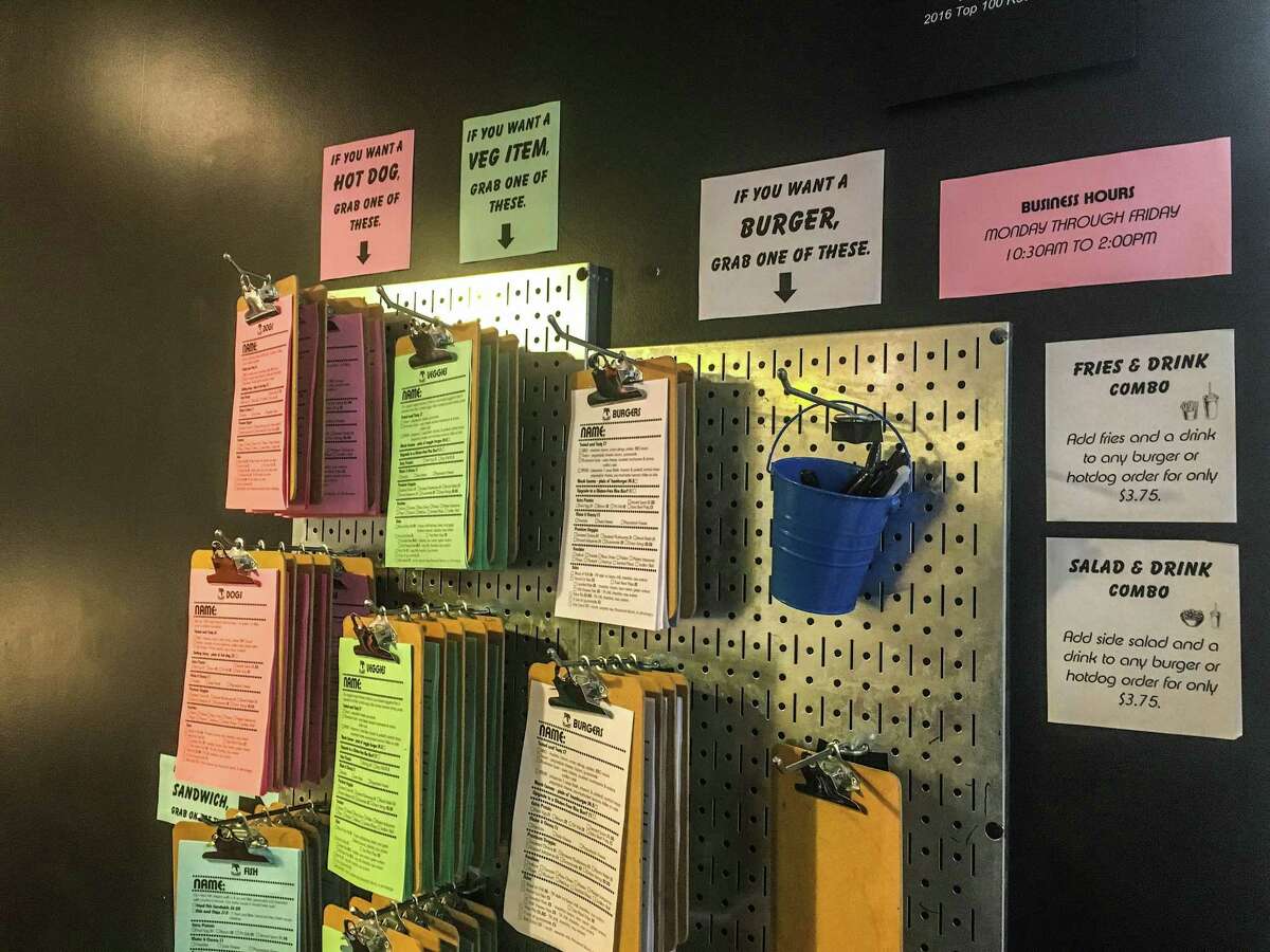 The ordering clipboards, ready to grab at Burger-Chan in Greenway Plaza.