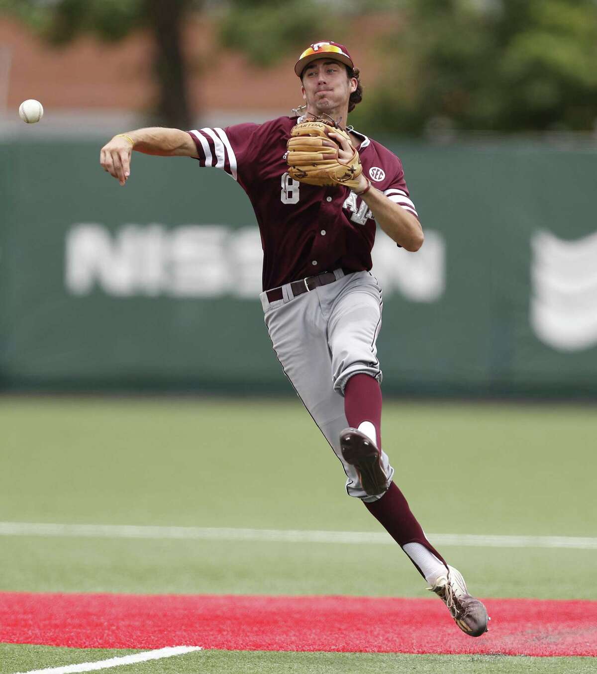 Texas A&M infielder Braden Shewmake makes the throw to first base during the second inning against Houston in an NCAA regional baseball game at Schroeder Park, in Houston on June, 5, 2017.