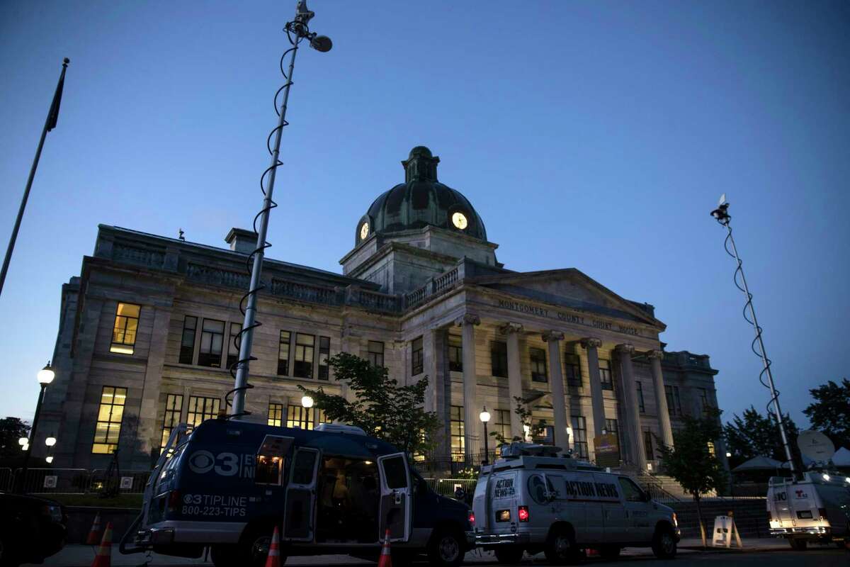 Television trucks are parked at the Montgomery County Courthouse for Bill Cosby's sexual assault trial at the in Norristown, Pa., Thursday, June 8, 2017. A jury that heard seven hours of testimony from a woman who says Cosby drugged and assaulted her may soon hear from Cosby himself Â?— even if he doesn't take the stand. Prosecutors are expected to show jurors an earlier deposition in which Cosby said that he routinely gave women pills and alcohol before sexual encounters and gave at least one of them quaaludes, a now-banned sedative. (AP Photo/Matt Rourke)