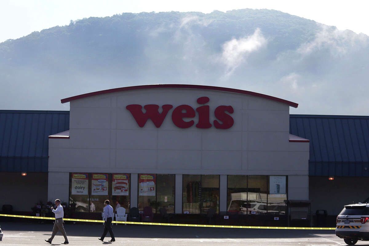 Pennsylvania State Police are investigating the murder of three people and suicide of the shooter 24-year-old Randy Robert Stair, of Dallas, Pa., at the Weis Supermarket on the Hunter Highway in Eaton Township, Pa., on Thursday, June 8, 2017. (Jake Danna Stevens/ The Times-Tribune, Via AP)