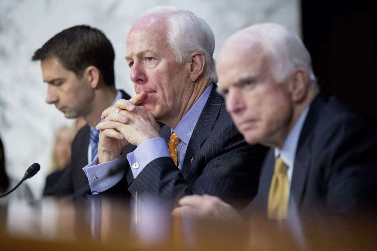 Texas Sen. John Cornyn, center, listens during a Senate Intelligence Committee hearing with James Comey, former director of the FBI. Cornyn was once considered as a replacement for the fired Comey, but Cornyn removed himself from consideration.