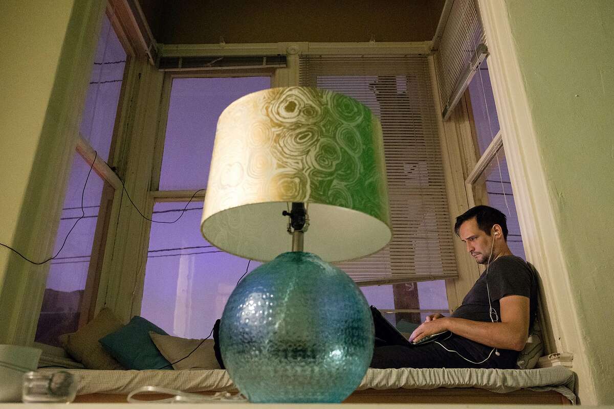 Daniel Kravtsov works on his computer late one night at his home in Hayes Valley in June. Kravtsov is one of thousands of foreign entrepreneurs who try to make it in the U.S. 