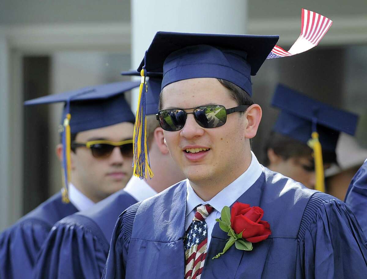Karl Zoubek, of Westport, sports an American Flag atop his cap as he prepares for King School Class of 2017 Commencement Exercises in Stamford June 2.