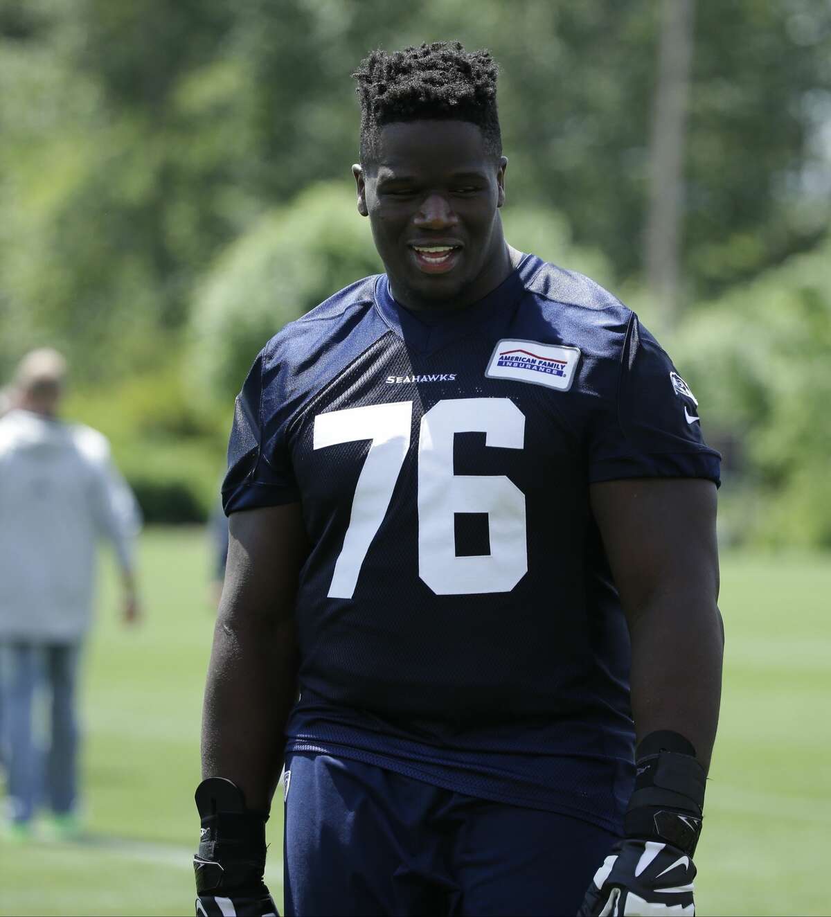 Frank Clark punches Germain Ifedi, ejected from Seahawks camp