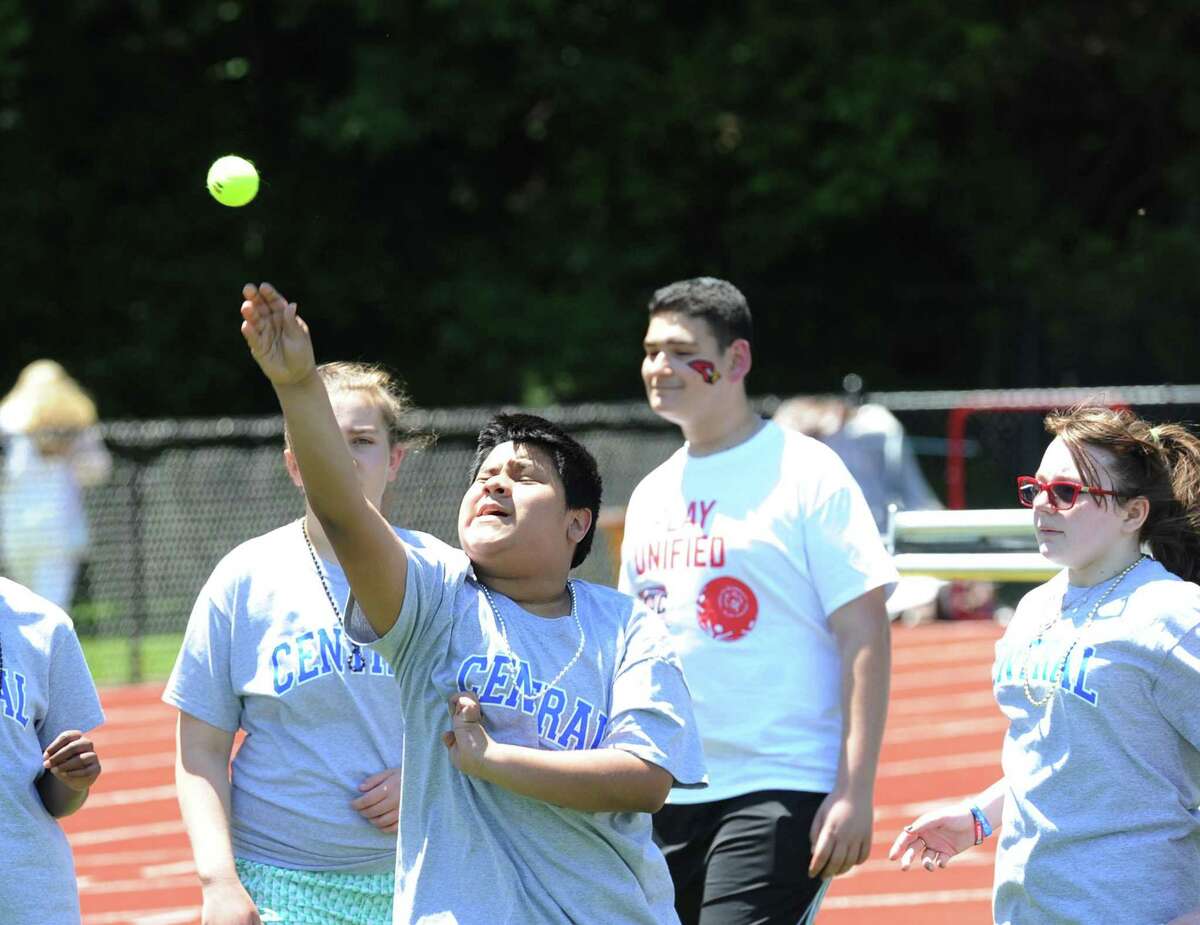 Gabe Prado, 12, a Central Middle School sixth grade student participated in the tennis ball throw during the first annual Unified Sports/Special Olympics Field Day on the track at Greenwich High School, Conn., Friday, June 9, 2017. All the middle schools in the district participated along with a team from Greenwich High School as well as teams from Port Chester High School and Middle School of N.Y.