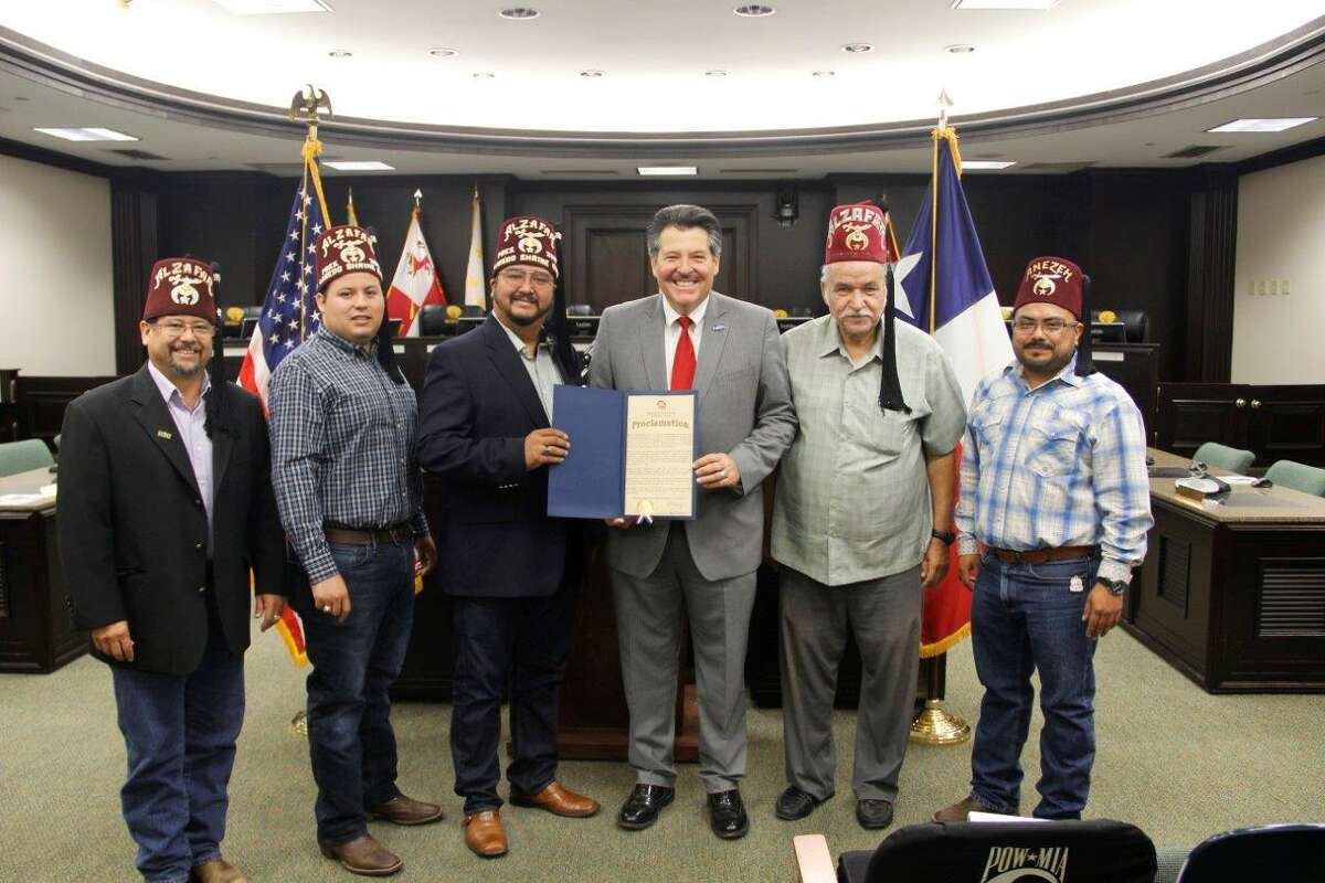 Laredo Mayor Pete Saenz stands alongside several shriners after a proclamation ceremony recognizing International Shriners Awareness Day at City Hall. Miguel Inclan, former president and current secretary for the Laredo Shriners, described the shriners as the "world’s greatest philanthropy.” “Our mission is to change lives for children and through the local clinics, patients do not have to travel to other cities, such as Houston, or Galveston, for treatment,” Inclan said. “The Shriners International Fraternity is extremely proud of Laredo's generosity.”