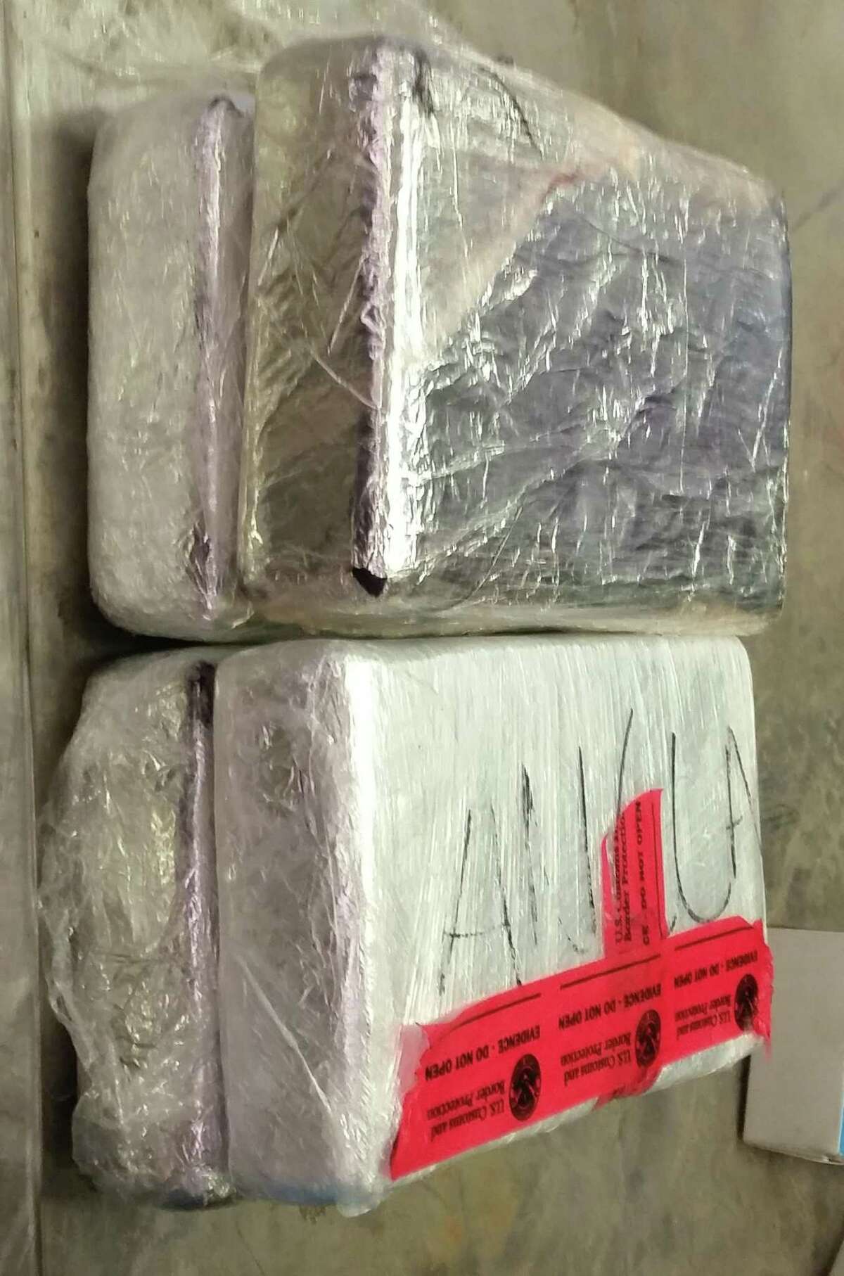 Pictured is the cocaine recently seized by CBP. A SENTRI program participant was carrying four packages of cocaine in the vehicle he was driving. Officers discovered the narcotics upon further inspection.
