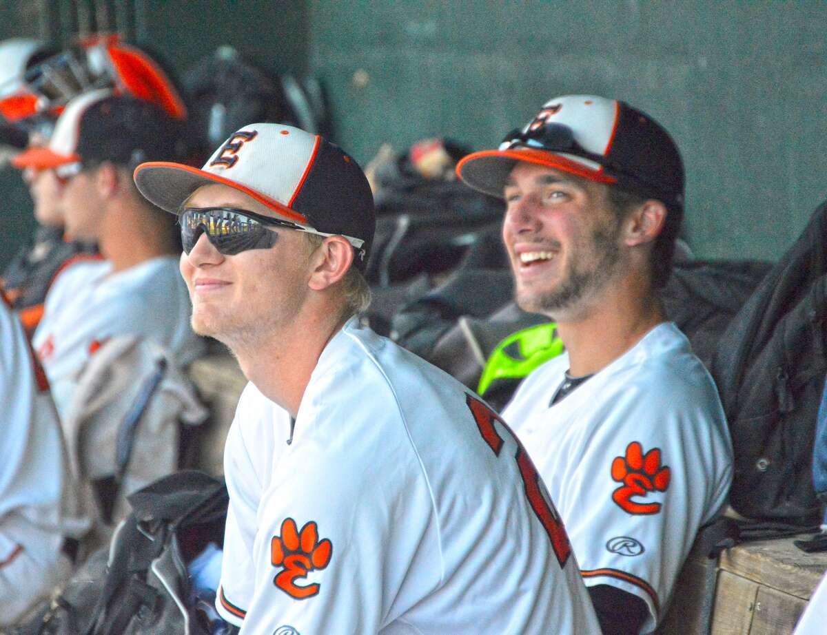 Andrew Yancik, left, and Dan Picchiotti, sit in the dugout prior to the start of Saturday's game.