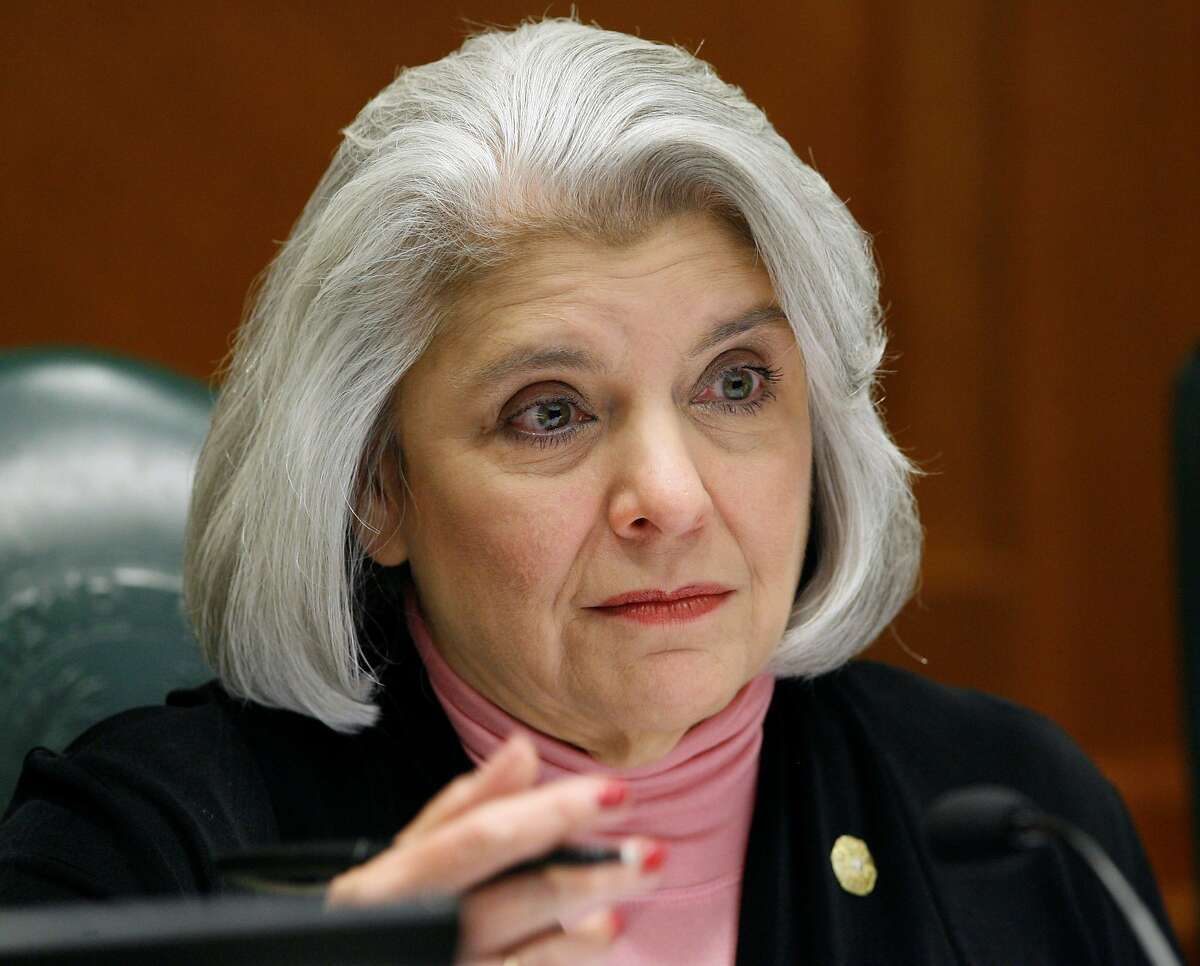 FILE - This May 28, 2008, file photo shows Sen. Judith Zaffirini, D-Laredo, in Austin, Texas. Texas locks up more people who can't afford to pay tickets and fines than any other state, but that could change if Republican Gov. Greg Abbott signs off on bipartisan bills that would require judges to offer alternatives such as community service, payment plans or waivers. Zaffirini authored her chamber's version of the bill, and said it was "of extreme importance for low-income people" that the changes become law. "If a person can't pay, it spirals from a low-level to high-level problem," said Zaffirini, noting that people often lose their jobs during such jail stints. (AP Photo/Harry Cabluck, File)
