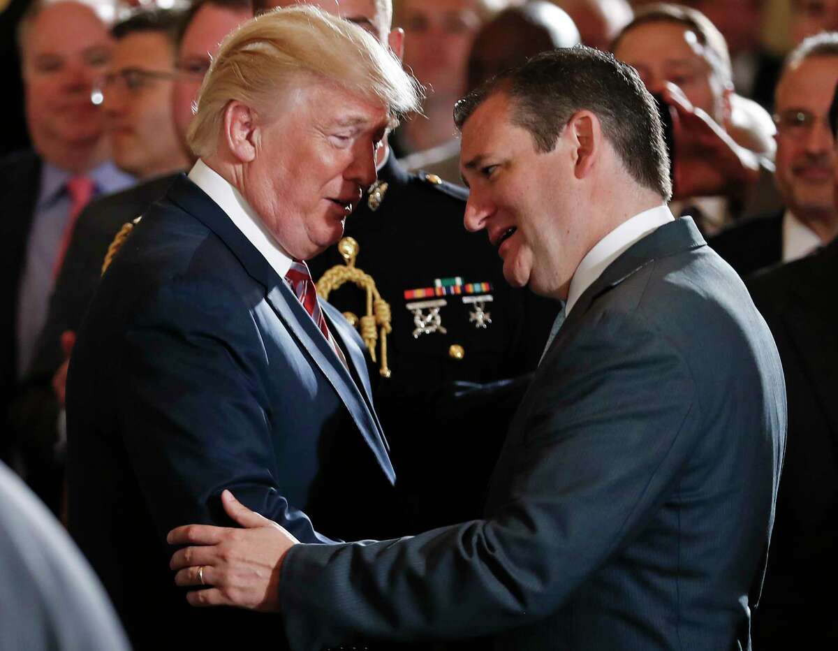 President Donald Trump shakes hands with and talks to Sen. Ted Cruz, R-Texas, in the East Room at the White House in Washington, Monday, June 5, 2017, after a ceremony to announce the Air Traffic Control Reform Initiative. (AP Photo/Carolyn Kaster)
