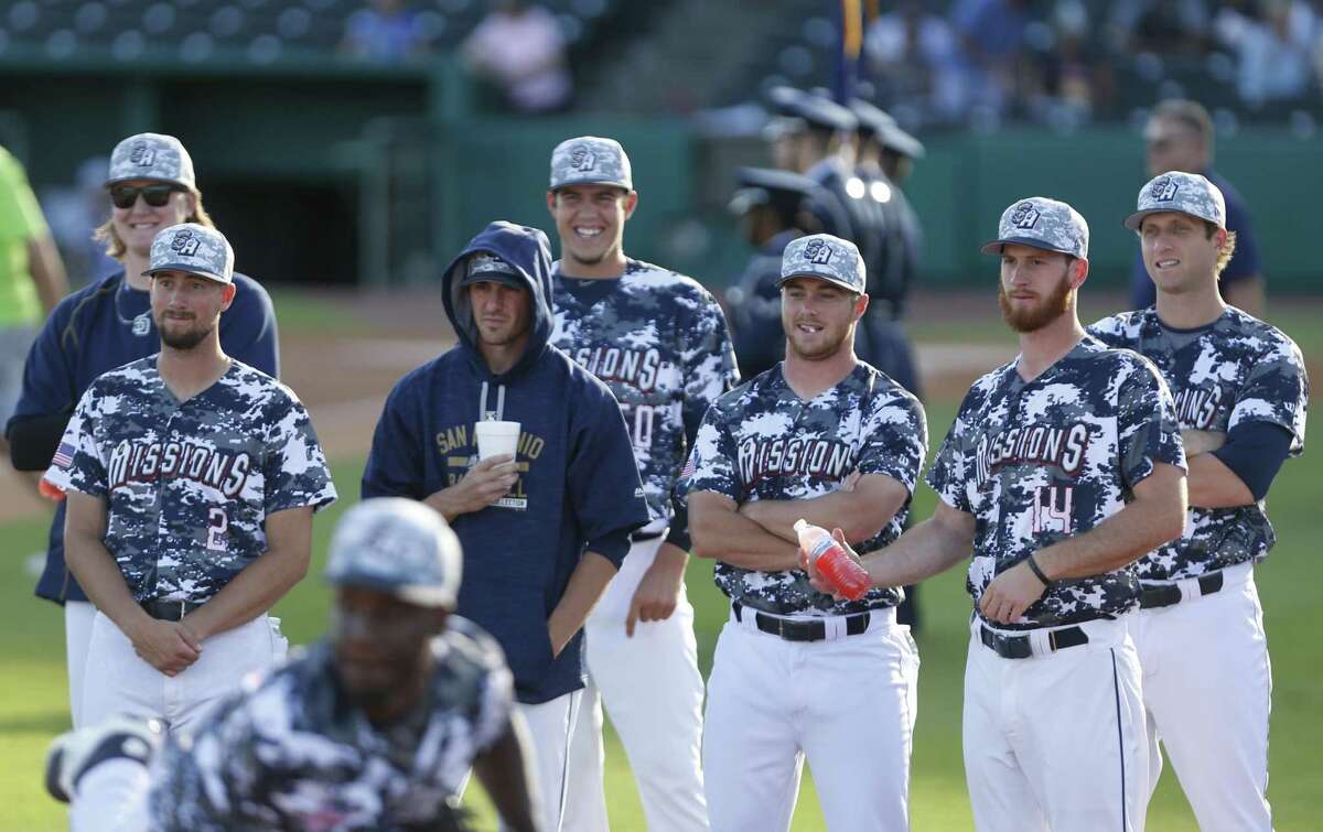 Pitching staff of the San Antonio Missions watch starter Enyel go thru his warm-ups on on June 7, 2017.