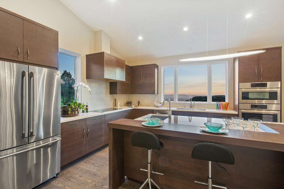 East Bay Brothers Look To Raise Bar For Stylish Energy Efficient A French Door Refrigerator Custom Cabinetry And Stainless Steel Liances Outfit The Eat In