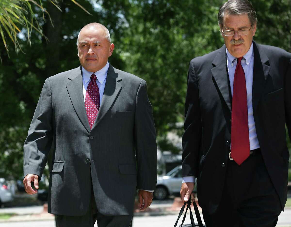 Jimmy Galindo, left, former Reeves County Judge enters the Federal Courthouse on Monday, June 12, 2017, with his lawyer David Botsford. Galindo pleaded guilty to taking bribes he's alleged to have split with state Sen. Carlos Uresti.