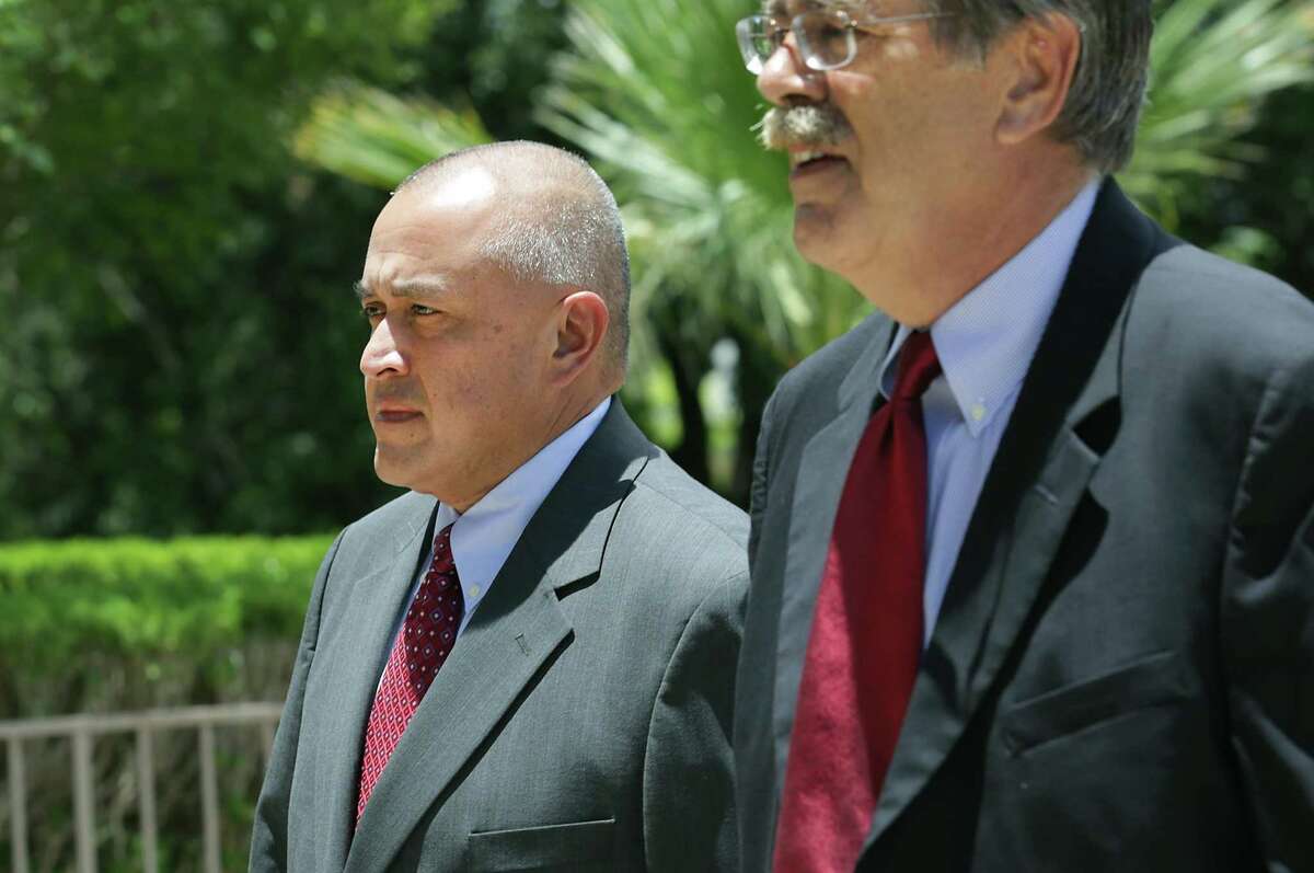 Jimmy Galindo, left, former Reeves County Judge enters the Federal Courthouse on Monday, June 12, 2017, with his lawyer David Botsford. Galindo pleaded guilty to taking bribes he's alleged to have split with state Sen. Carlos Uresti. He had been facing six years in prison; on Tuesday, he was sentenced to a lower term of two and a half years in prison because he cooperated with federal officials.