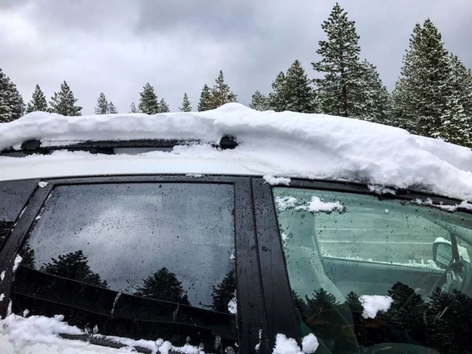 Storm churns waves up to 6 feet on Lake Tahoe, drops foot of snow in