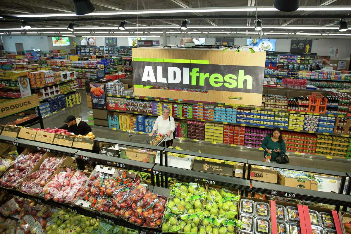 Customers shop for produce at an Aldi store in Hackensack, N.J. The German chain has 32 stores in the Houston area.