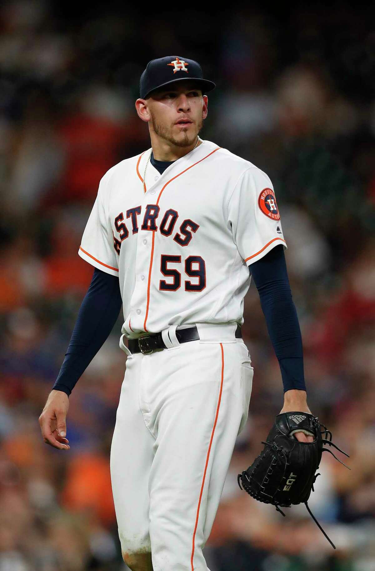 Houston Astros starting pitcher Joe Musgrove (59) reacts after getting pulled during the fifth inning of an MLB game at Minute Maid Park, Monday, June, 12, 2017.