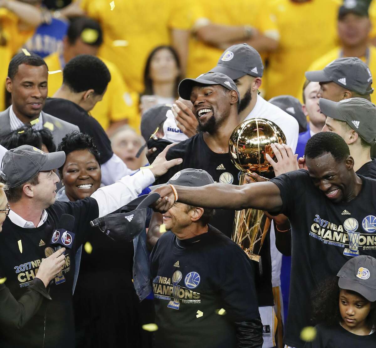 Golden State Warriors' Kevin Durant holds the the Larry O�Brien NBA Championship Trophy after the Golden State Warriors defeated the Cleveland Cavaliers 129-120 in Game 5 to win the 2017 NBA Finals at Oracle Arena on Monday, June 12, 2017 in Oakland, Calif.