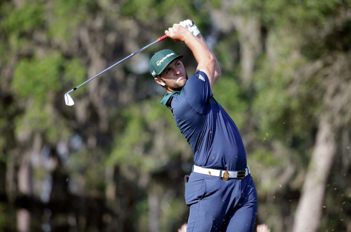 Jon Rahm, of Spain, hits from the 12th hole during the second round at The Players Championship golf tournament, Friday, May 12, 2017, in Ponte Vedra Beach, Fla. (AP Photo/Lynne Sladky)