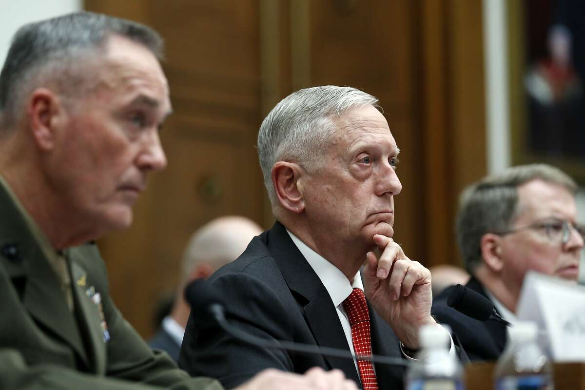 Joint Chiefs Chairman Gen. Joseph Dunford, left, Defense Secretary Jim Mattis, and Defense Under Secretary and Chief Financial Office David Norquist, listen to a question as they testify at a House Armed Services Committee hearing on the FY'18 defense budget, on Capitol Hill, Monday, June 12, 2017, in Washington. (AP Photo/Alex Brandon)