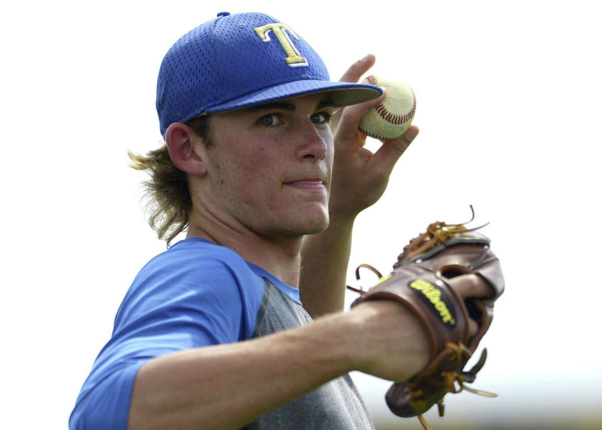Kerrville Tivy pitcher Asa Lacy warms up during practice on Wednesday, April 19, 2017. He has signed to play for Texas A&M and might be taken in the June MLB draft.