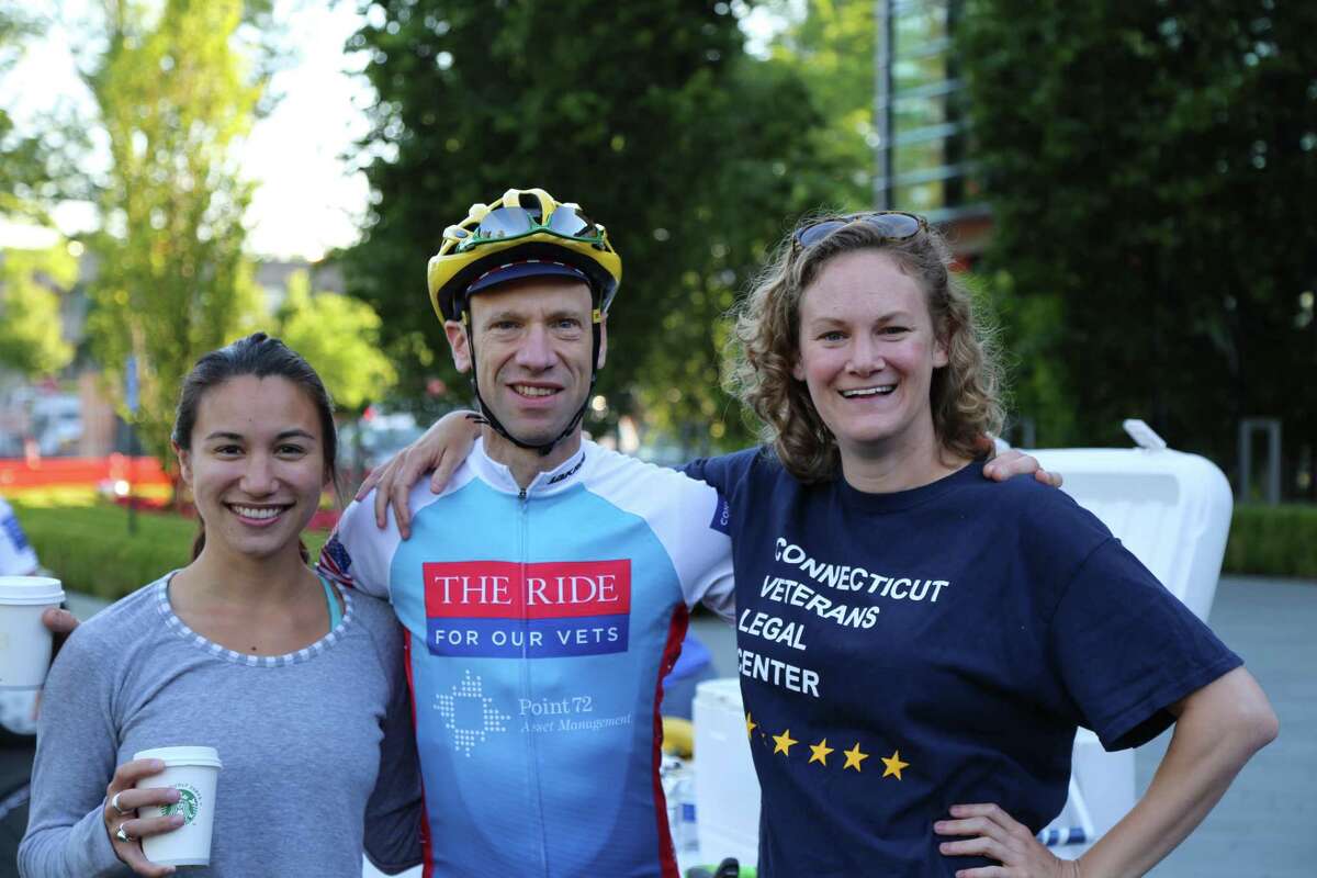 Margaret Middleton, right, executive director of the Connecticut Veterans Legal Center; Monte Frank, center, president of the Connecticut Bar Association; and former CVLC chief of staff Lorena Mitchell gather at the 2016 Ride for Our Vets fundraiser at the Point72 Asset Management campus at 72 Cummings Point Road in Stamford.