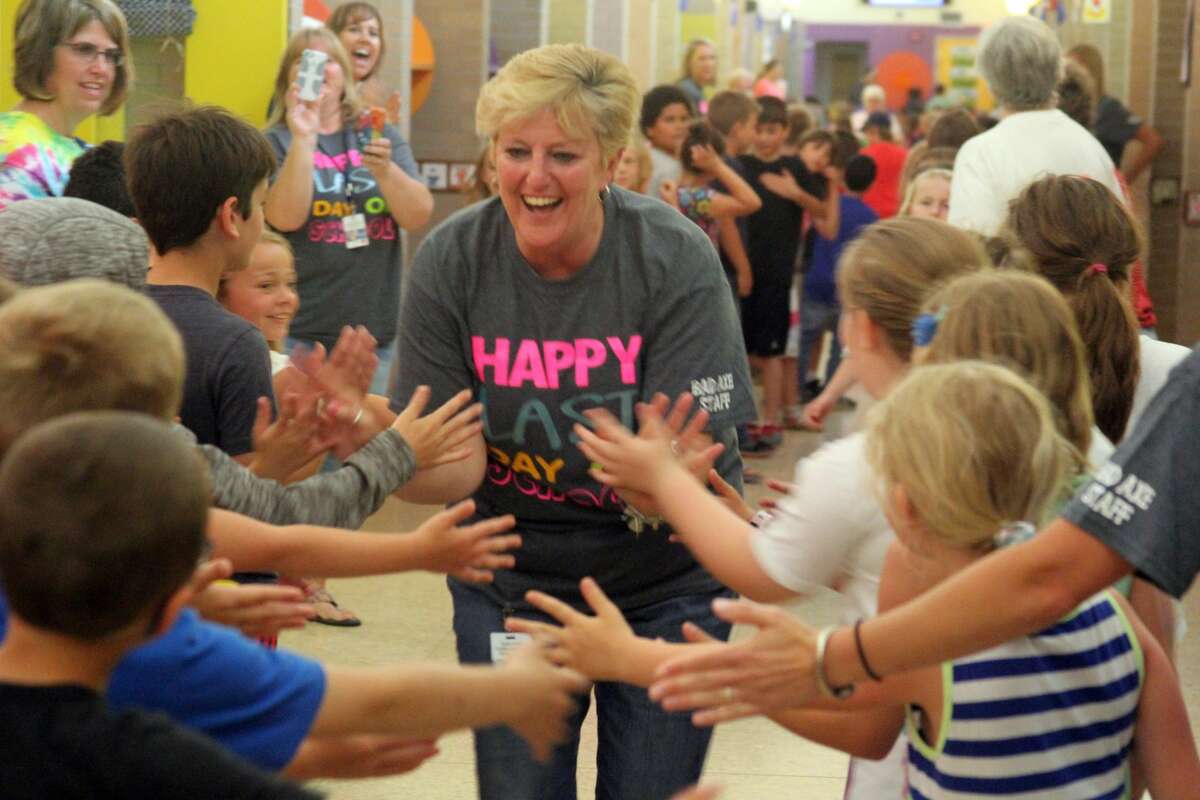 Bad Axe Elementary students and teachers lined the hallways Tuesday for a send-off event wishing third graders the best as they will move on to middle school next fall. The group also honored retiring second grade teacher Amanda Knox.