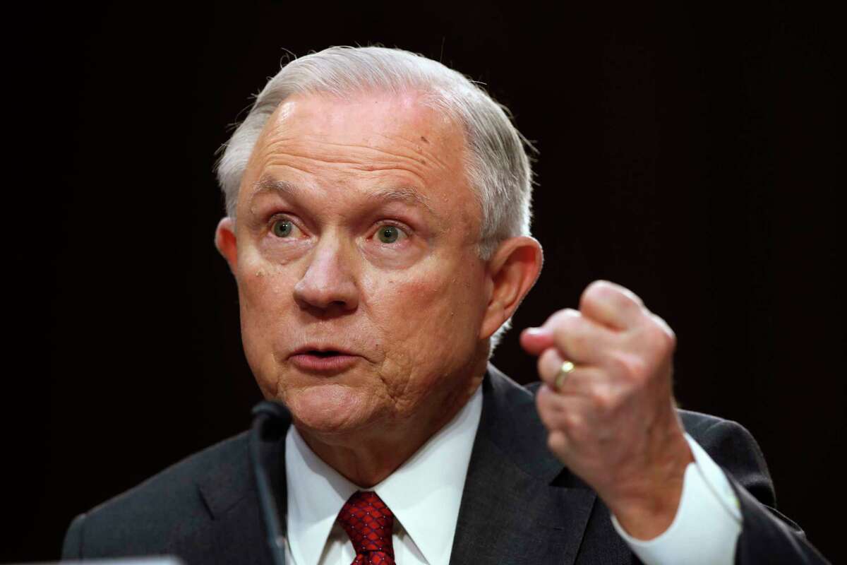 Attorney General Jeff Sessions gestures as he testifies on Capitol Hill in Washington, Tuesday, June 13, 2017, before the Senate Intelligence Committee hearing about his role in the firing of James Comey, his Russian contacts during the campaign and his decision to recuse from an investigation into possible ties between Moscow and associates of President Donald Trump.