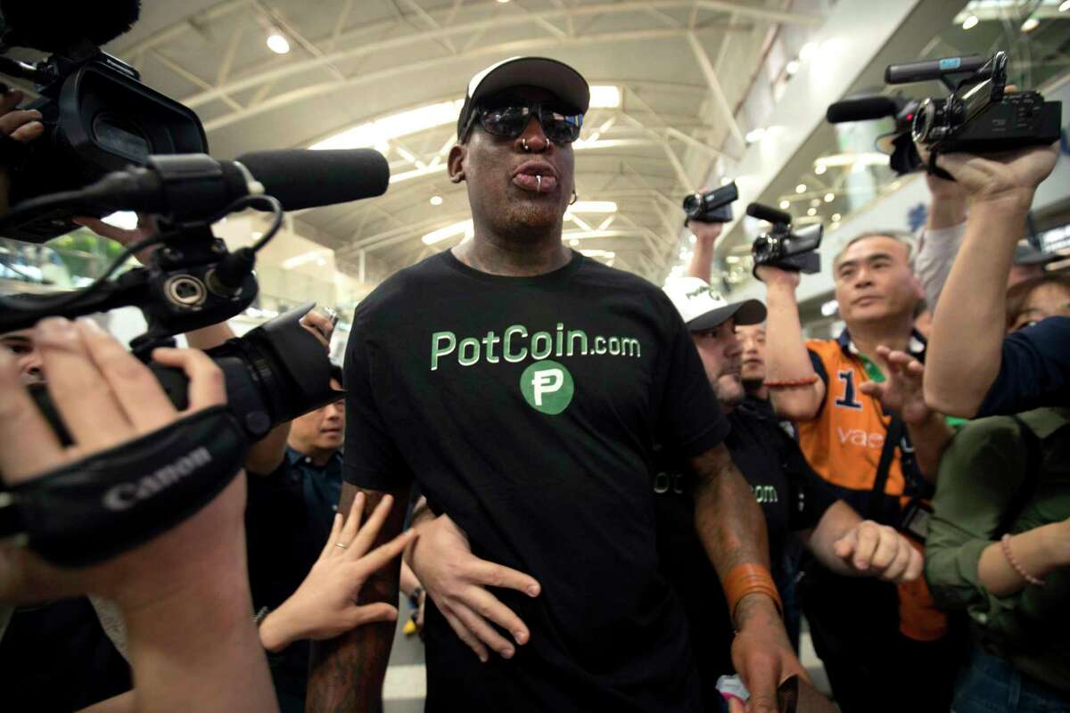 Former NBA player Dennis Rodman arrives at Beijing International Airport on Tuesday on his way to North Korea. CNN reported Rodman proceeded to Pyongyang from there.