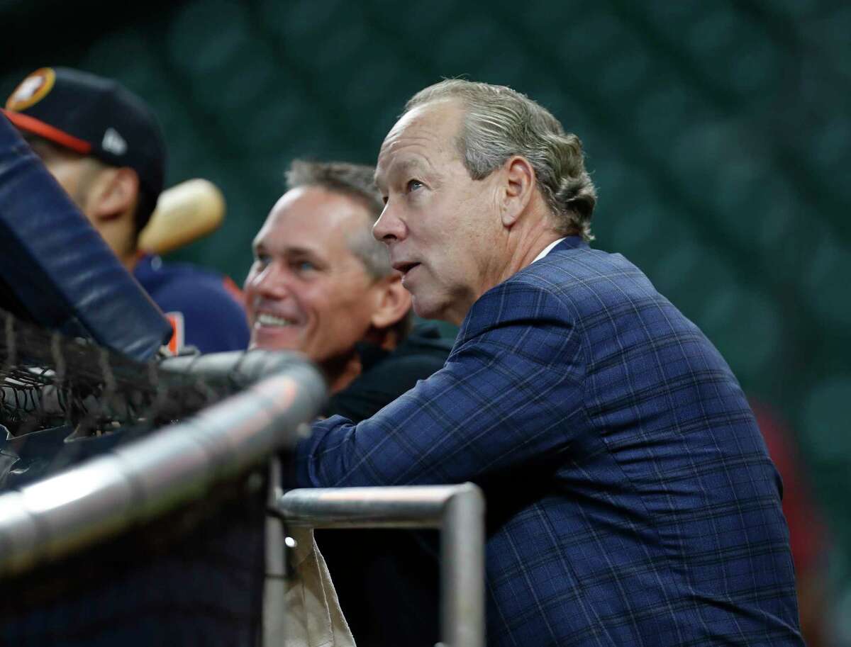 Houston Astros owner Jim Crane chats with Craig Biggio during batting practice before the start of an MLB game at Minute Maid Park, Tuesday June, 13, 2017.