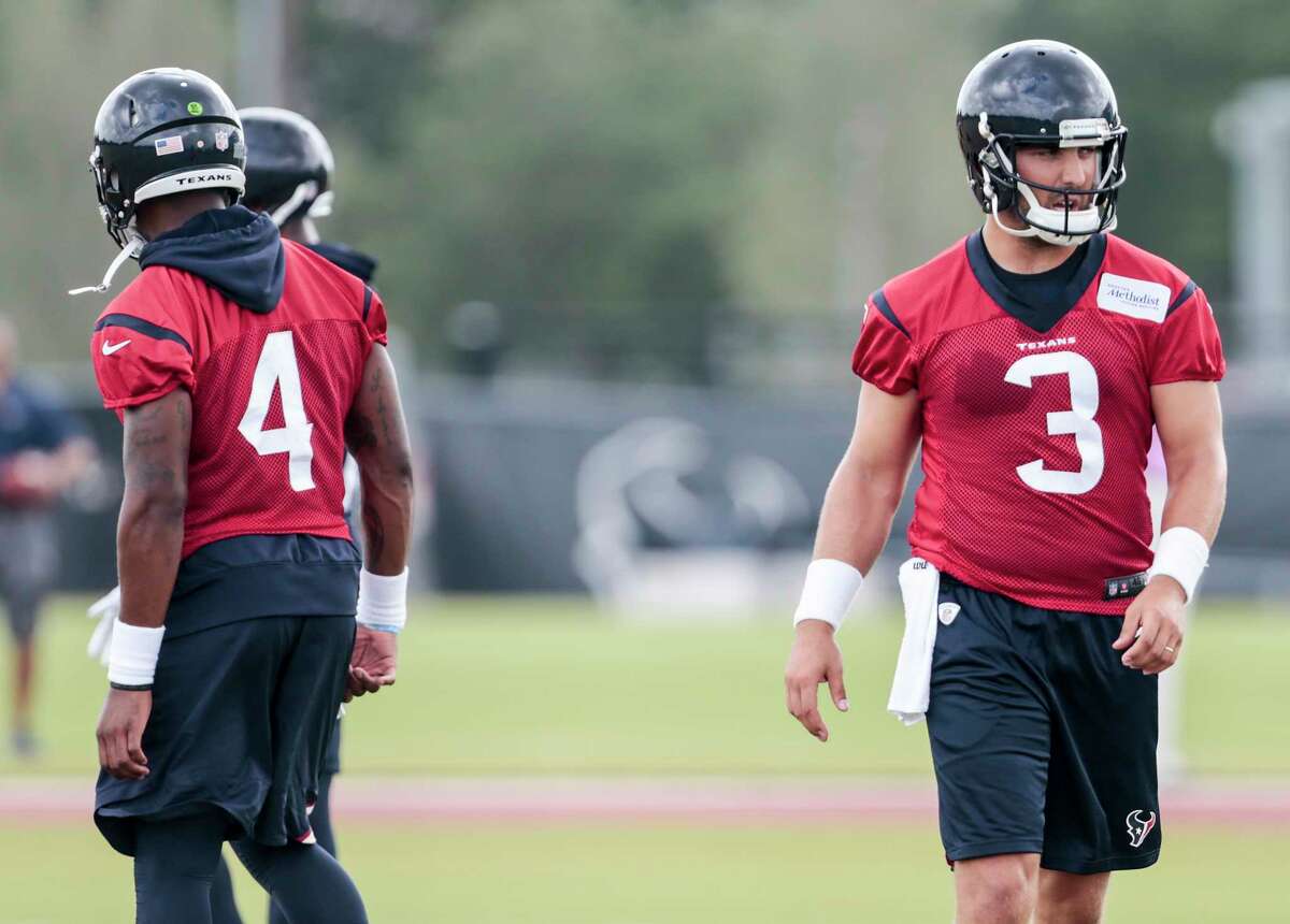 Even though Tom Savage, right, is the main man in the Texans' offense during this week's minicamp, the spotlight still finds its way to No. 1 draft pick Deshaun Watson, left.