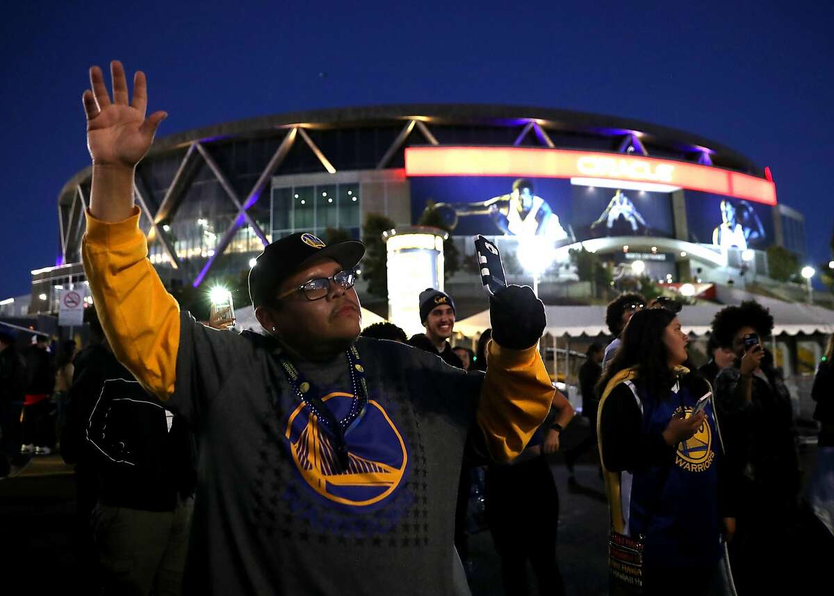 OAKLAND, CA - JUNE 12: Golden State Warriors celebrate outside of Oracle Arena on June 12, 2017 in Oakland, California. The Golden State Warriors defeated the Cleveland Cavaliers in game five of the NBA Finals by a score of 129-120 to win the NBA Championship. (Photo by Justin Sullivan/Getty Images)