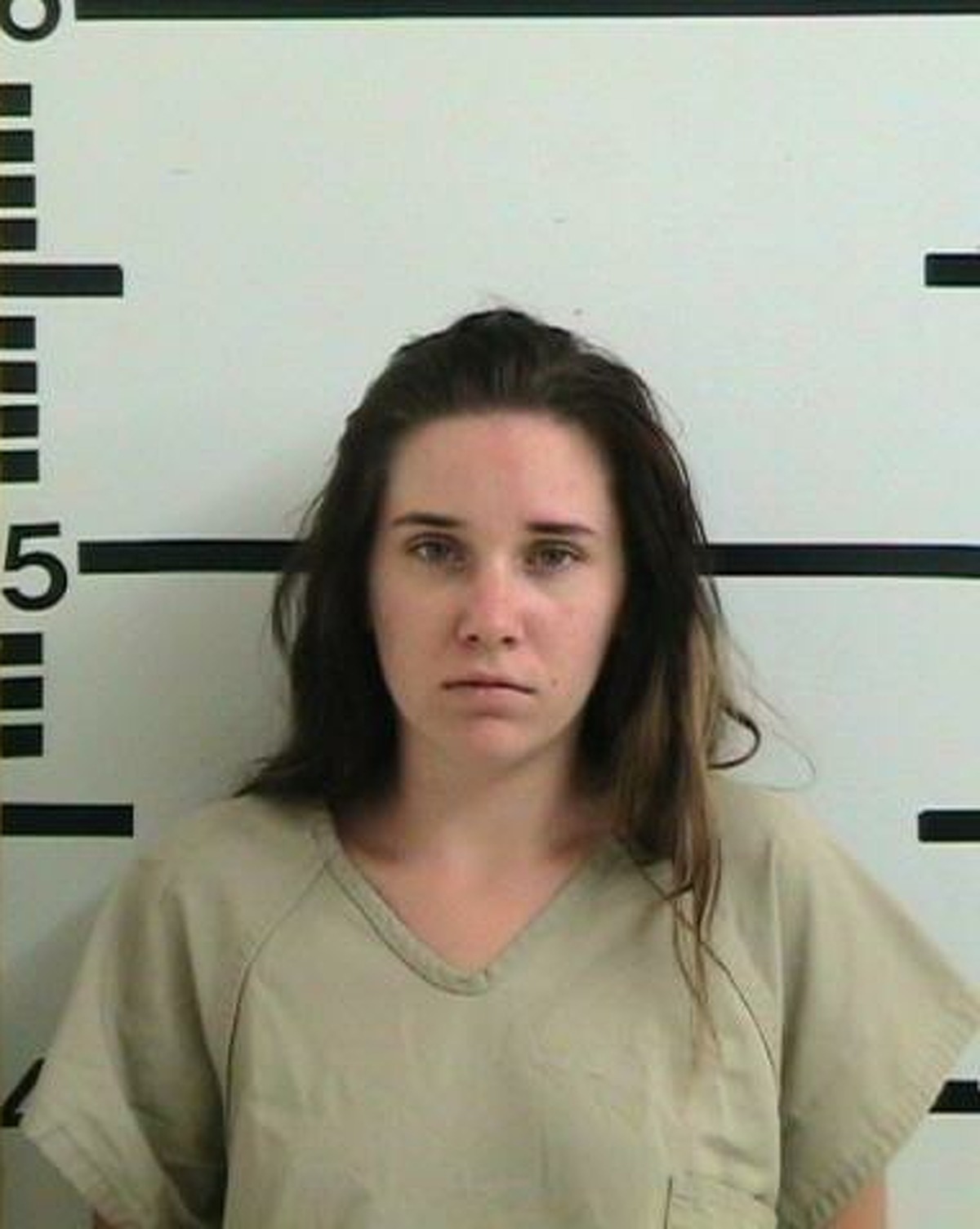 Amanda Kristene Hawkins, 19, was charged with two counts of child endangerment after her two daughters, ages 1 and 2, died June 8 after being left in her SUV for 15 hours in front of a friend's house in Kerrville. Hawkins was arrested in San Antonio and was transferred to the Kerrville jail Monday, June 12.