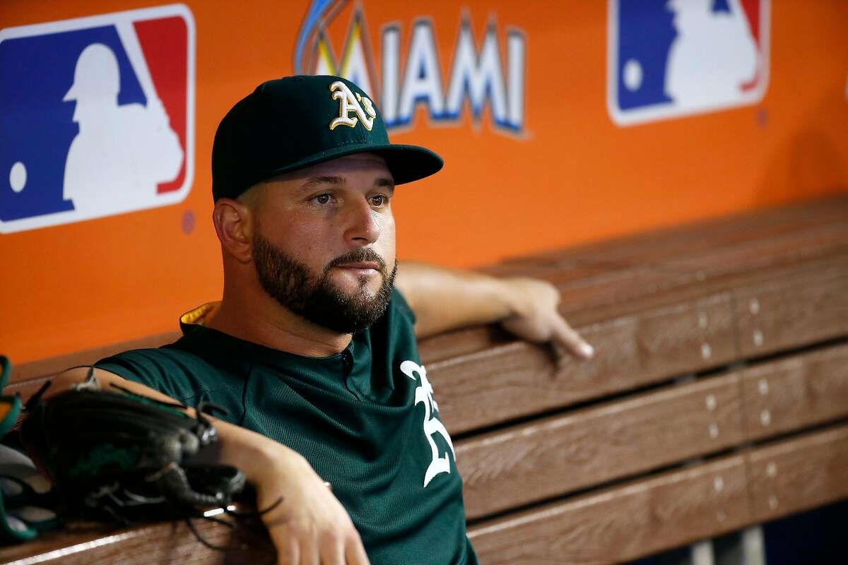 Oakland Athletics first baseman Yonder Alonso looks from the dugout before the start of a game against the Miami Marlins at Marlins Park in Miami on Tuesday, June 13, 2017. (David Santiago/El Nuevo Herald/TNS)