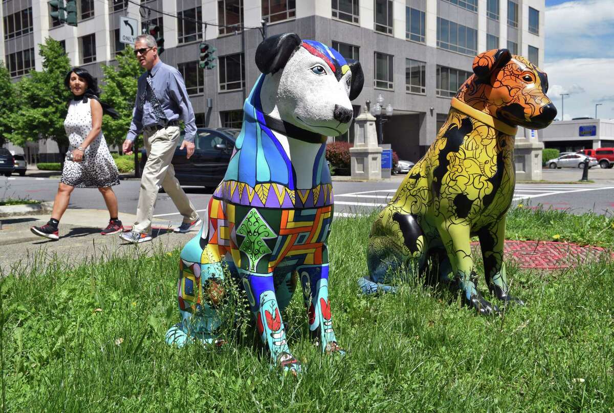 The first two of 20 3-foot-tall statues of Nipper as part of ?“Downtown is Pawsome,?” outside the Albany Center Gallery Friday June 9, 2017 in Albany, NY. (John Carl D'Annibale / Times Union)
