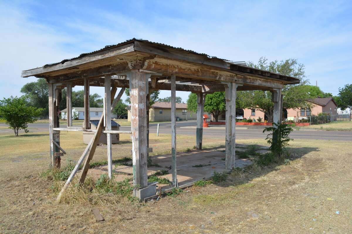 Chuck Humphreys has a mystery on his hands. He is trying to learn the history of a well-built -- but now deteriorating -- structure in the 1600 block of El Paso. The wooden open-sided carport or awning likely dates to the 1920s or 1930s and shows evidence of having been moved years ago from its original site. When Humphreys acquired it, the small shop-style structure was enclosed. Humphreys has since removed the exterior walls which are not original to the building. That partial demolition revealed a faded green-and-white paint scheme which was used on most service stations during the first half of the 20th century. The structure possibly could have served as an open-air garage for oil changes and minor mechanical repairs. The arched roof and quality construction are indicative of such structures from that period. It quite likely could have originally been located along the Amarillo Highway, which come into Plainview on North Columbia until the late 1960s. Anyone with information about the structure should contact Humphreys at 292-0598.