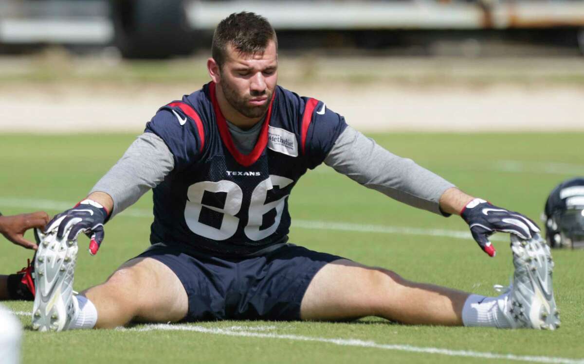 Houston Texans rookie tight end Zach Conque stretches during Texans minicap at Texans Practice facility Wednesday, June 14, 2017, in Houston.