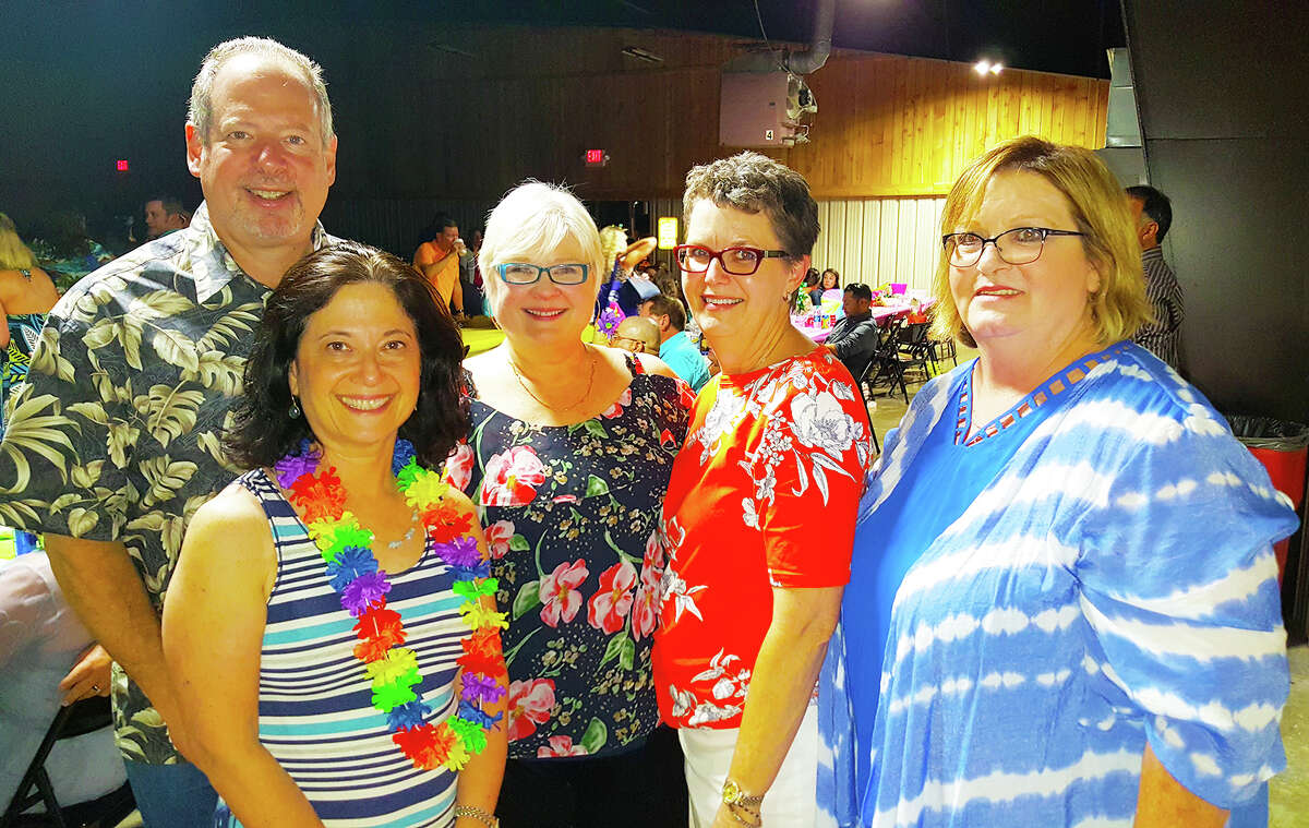 OakBend Medical Center, which has been the presenting sponsor since 2008, had a great time at Surf's Up. From left are: OakBend CEO Joe Freudenberger, Laura Freudenberger, OakBend Public Relations Linda Drummond, Lamar Educational Awards Foundation Executive Director Janice Knight and OakBend CCO Donna Ferguson.