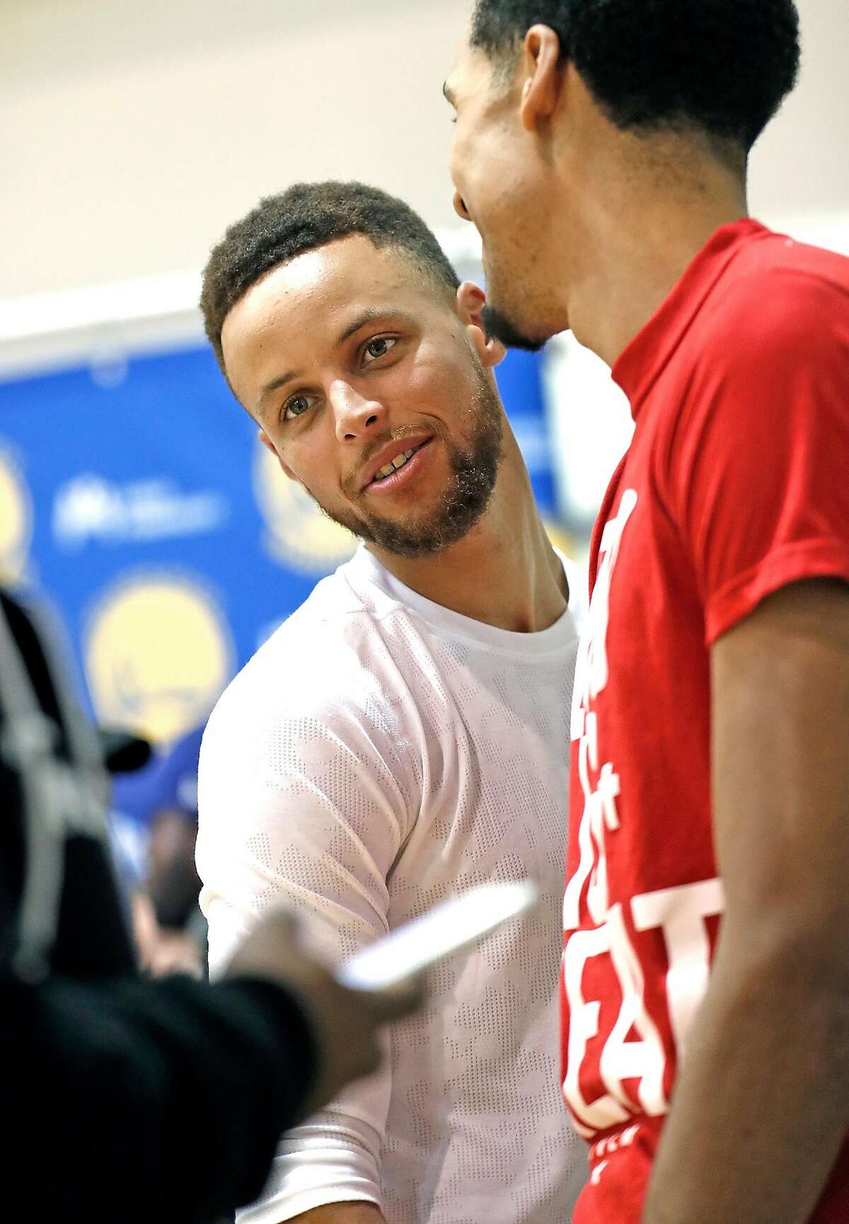 Golden State Warriors' Stephen Curry and Shaun Livingston during media availability at the Warriors' practice facility in Oakland, Calif., on Wednesday, June 14, 2017.