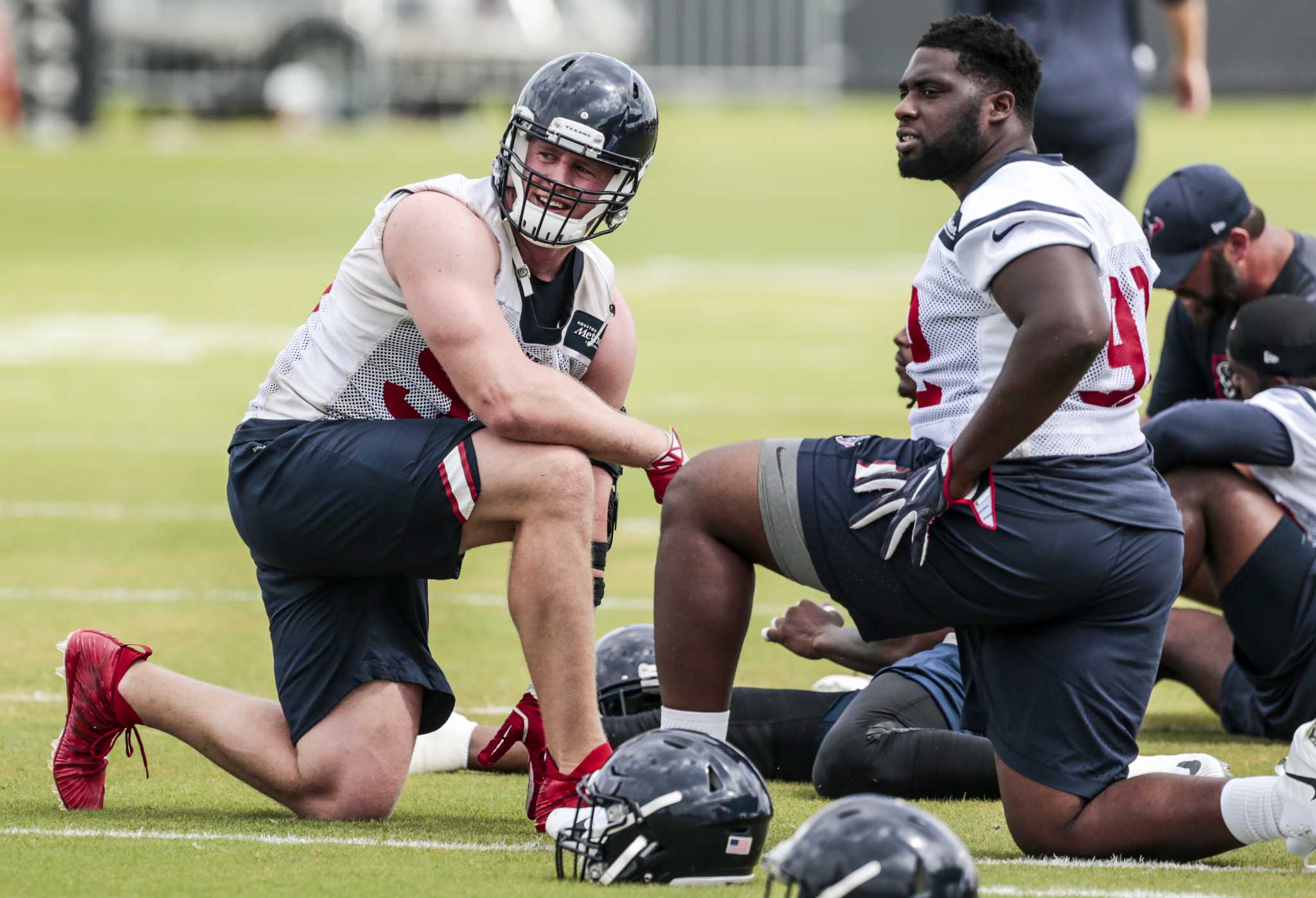 Houston Texans' J.J. Watt prepares to throw out the first pitch