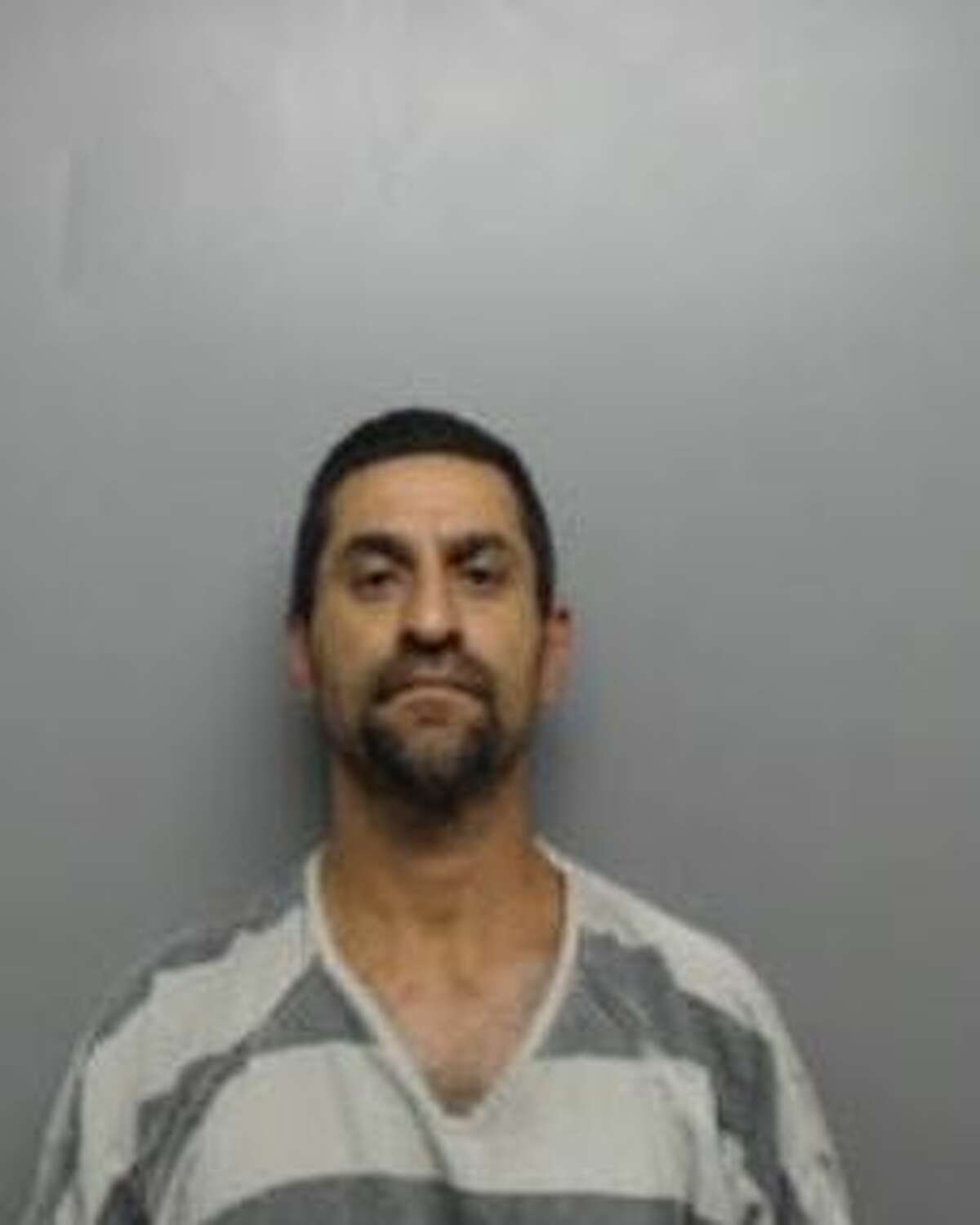 Sergio San Miguel, 49, was arrested and charged with aggravated assault with a deadly weapon.