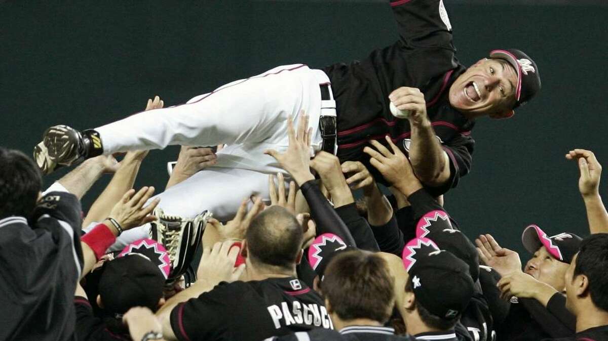 2005: Manager Bobby Valentine shows a victory sign as he is tossed into the air by his Chiba Lotte Marines after clinching the Pacific League championship at Yahoo Dome in Fukuoka, southwestern Japan.