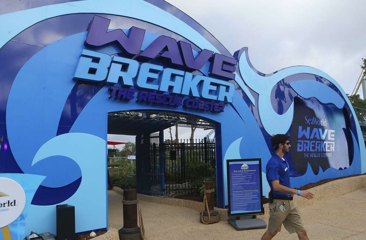 Riders enjoy the new Wave Breaker: The Rescue Coaster at SeaWorld in San Antonio. Inspired by the SeaWorld Animal Rescue Team, the roller coaster has jet-ski style cars that hug riders in a straddled position and rides through steeply banked turns. The ride covers 2,600 feet of track and opens to the public Friday.