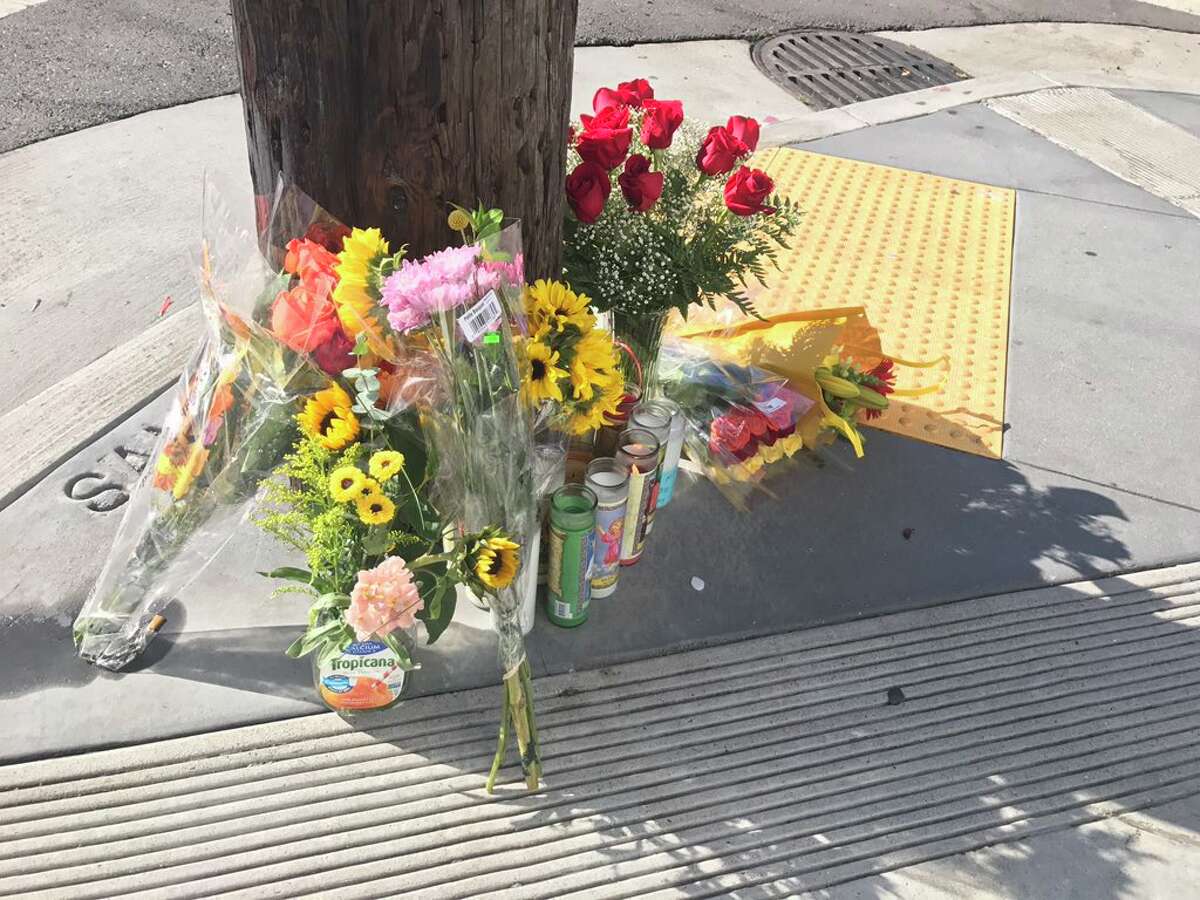 A small memorial is shown in the aftermath shooting of Wednesday's UPS shooting in Potrero Hill, San Francisco.