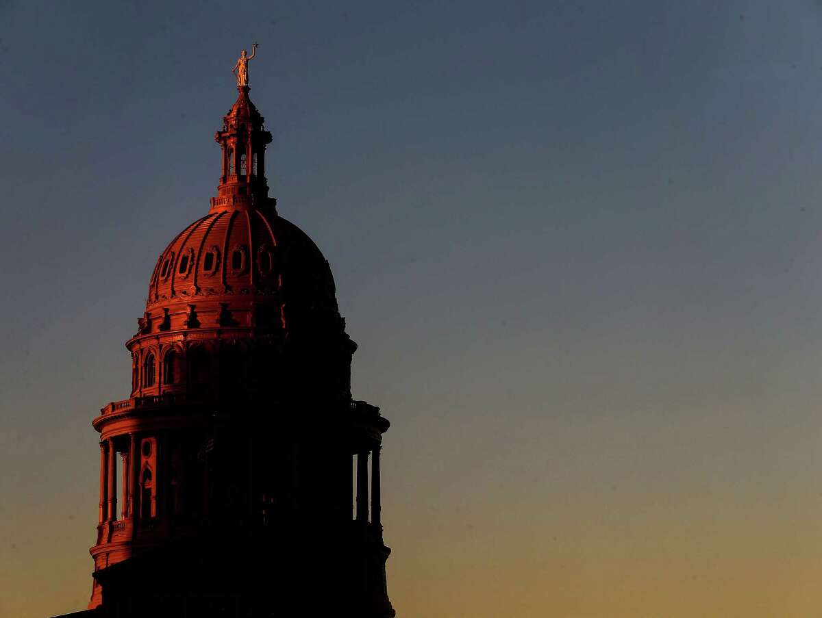 The sun sets over the Texas Capitol Tuesday, Oct. 11, 2016, in Austin. Keep going for a look at the history of same-sex marriage in Texas. 