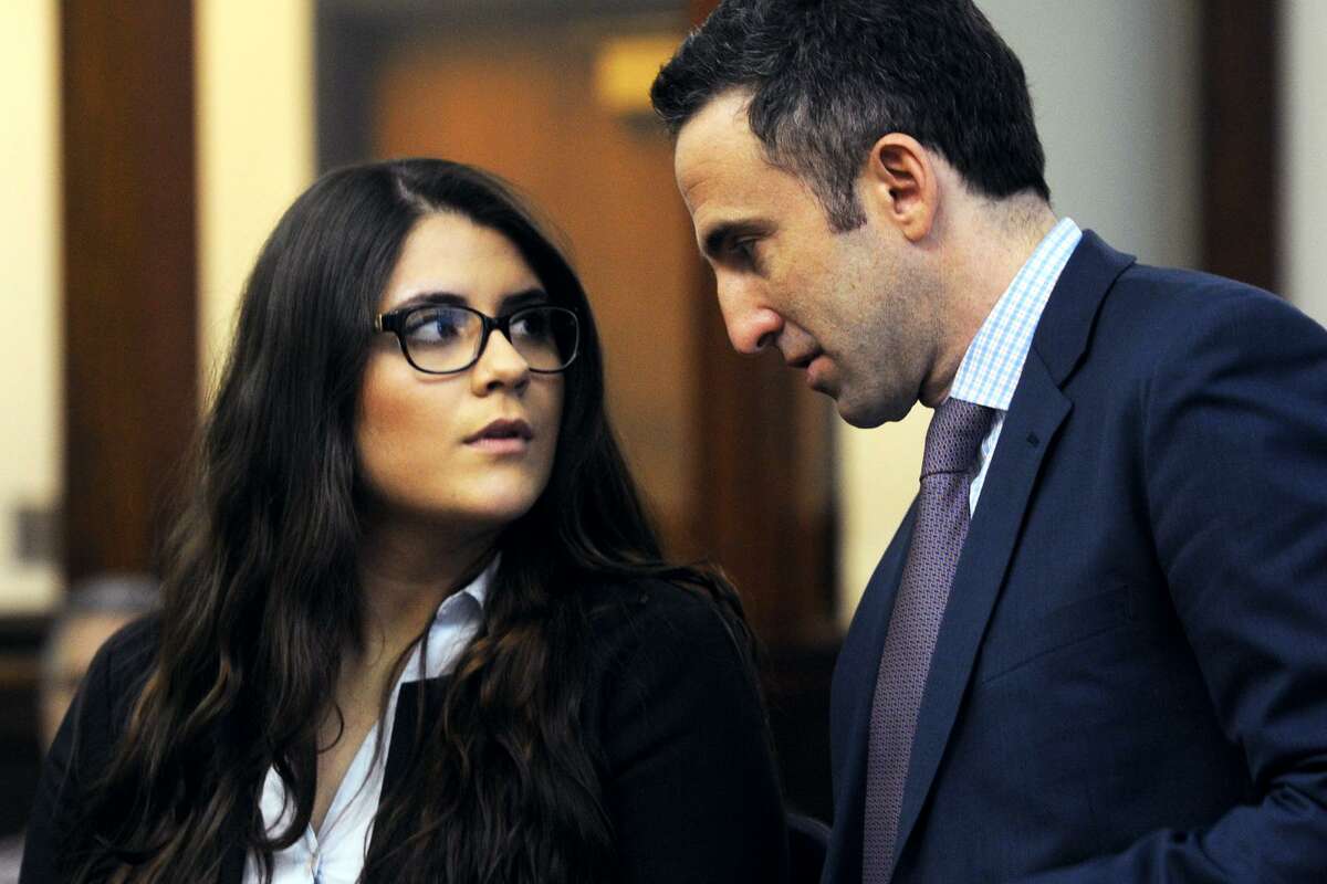 Nikki Yovino, seen here with her attorney Mark Sherman, in Bridgeport Superior Court in March. Yovino is charged with second-degree falsely reporting an incident and tampering with or fabricating physical evidence.